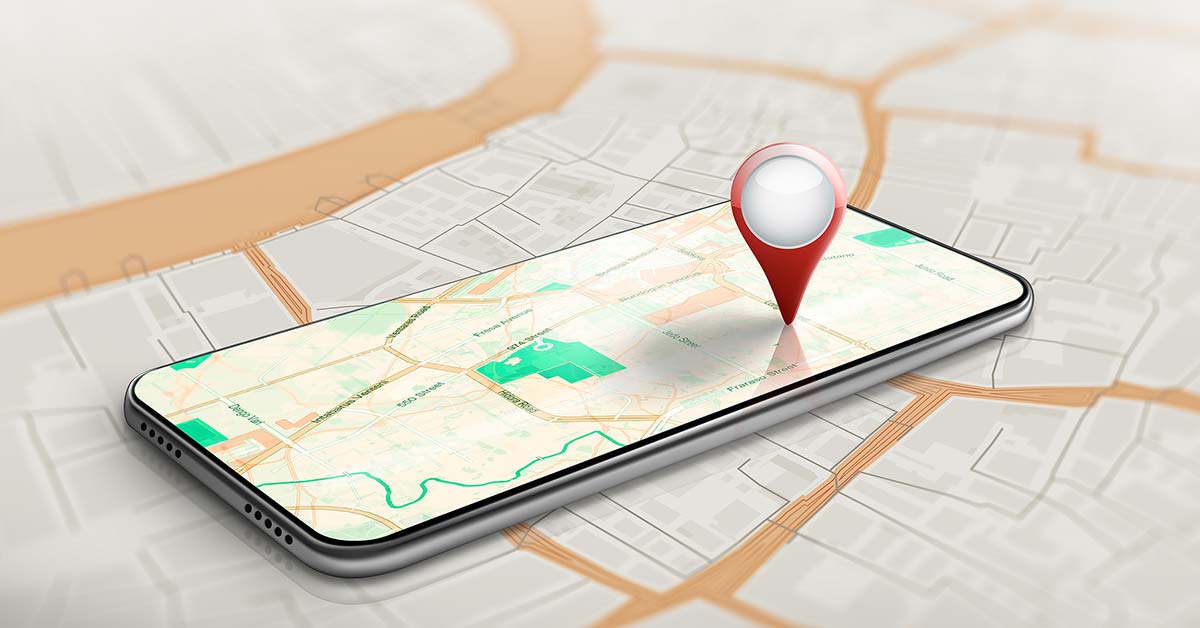 Mobile smartphone displaying a map and pinpoint location.