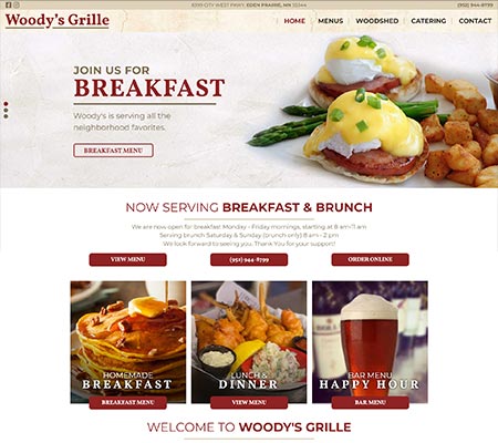 Example of Woodys Grille sports bar and restaurant website design by 240 Group in Ada.